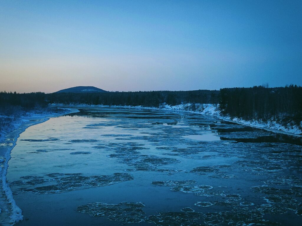 Frozen sea at dusk in Swedish Lapland